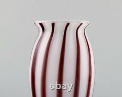 Murano, vase on foot with cherry colored stripes in mouth blown art glass, 1960s