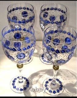 These are hand-blown Murano wine glasses in the Millefiori style. Signed